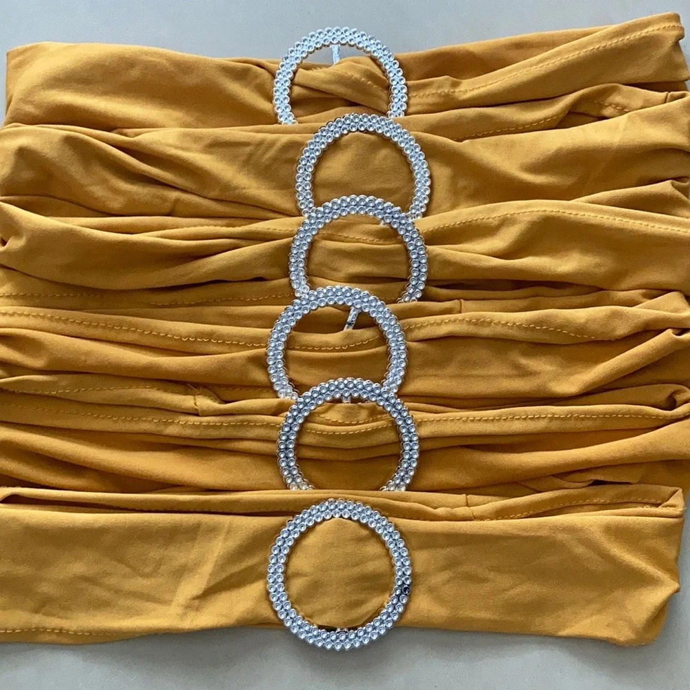 Chair Covers & gold chair bows New Year’s Eve, wedding, graduation, decor